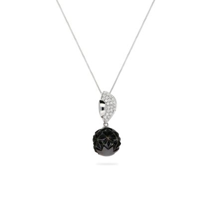 Carved Tahitian pearl pendant with diamonds