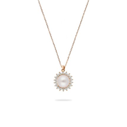 Freshwater pearl pendant surrounded by diamonds